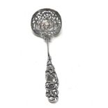 Antique dutch silver shifter spoon central embossed panel measures approx 21cm long