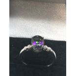 9ct white gold mystic topaz & diamond ring topaz measures approx 9mm by 7mm with 2 diamonds either