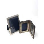 2 silver picture frames largest measures approx 15cm by 11cm