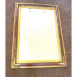 Large framed bevelled edge mirror, approximate measurements: Height 32 inches, Length 43.5 inches