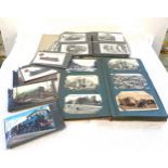 Selection of various vintage and later postcards in album