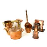 Selection vintage copper pieces to include small kettle, candle stick, bottle holder with glass