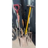 Selection of various garden tools to include spades etc