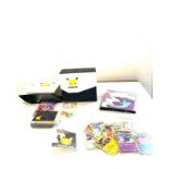Selection of assorted pokemon collectors cards etc