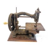 The Challenge antique Lockstitch Sewing Machine on wooden base