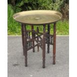 Circular brass top folding occasional table, diameter of table top: 22.5 inches