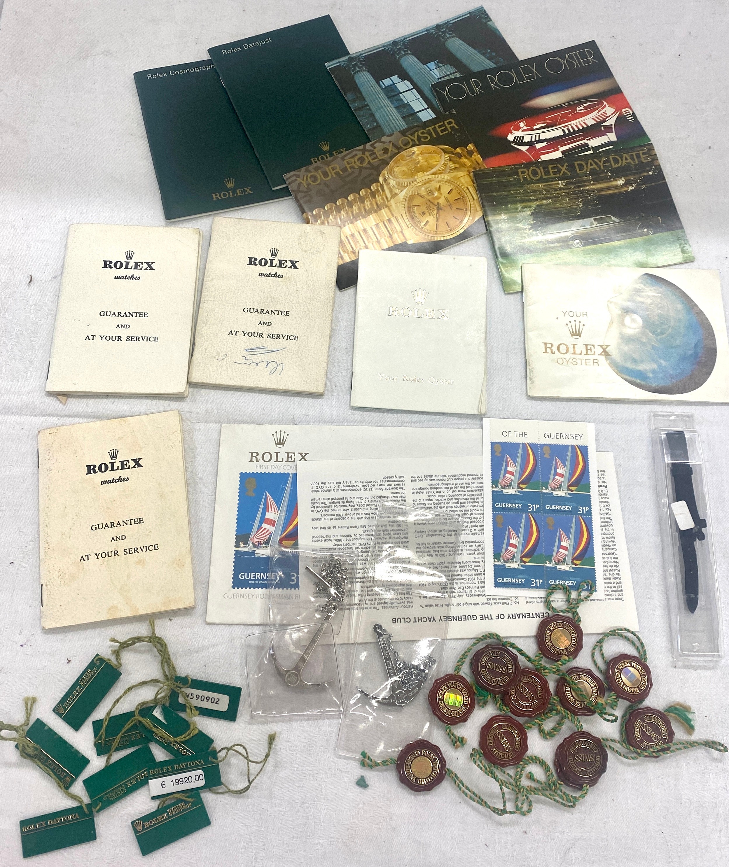 Selection of original Rolex collectable pieces to include Rolex manuals, ladies leather Rolex strap,