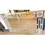 Square and Oblong patterned wall mirror, approximate measurements: Height 31.5 inches, Width 47