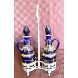 Bohemian glass condiment set in silver plated stand, height approx 11.5 inches