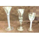 2 vintage twisted stem glasses and one antique glass