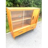 Teak 1 door 2 drawer glazed bookcase measures approx 33 inches tall 35.5 inches wide 11inches depth