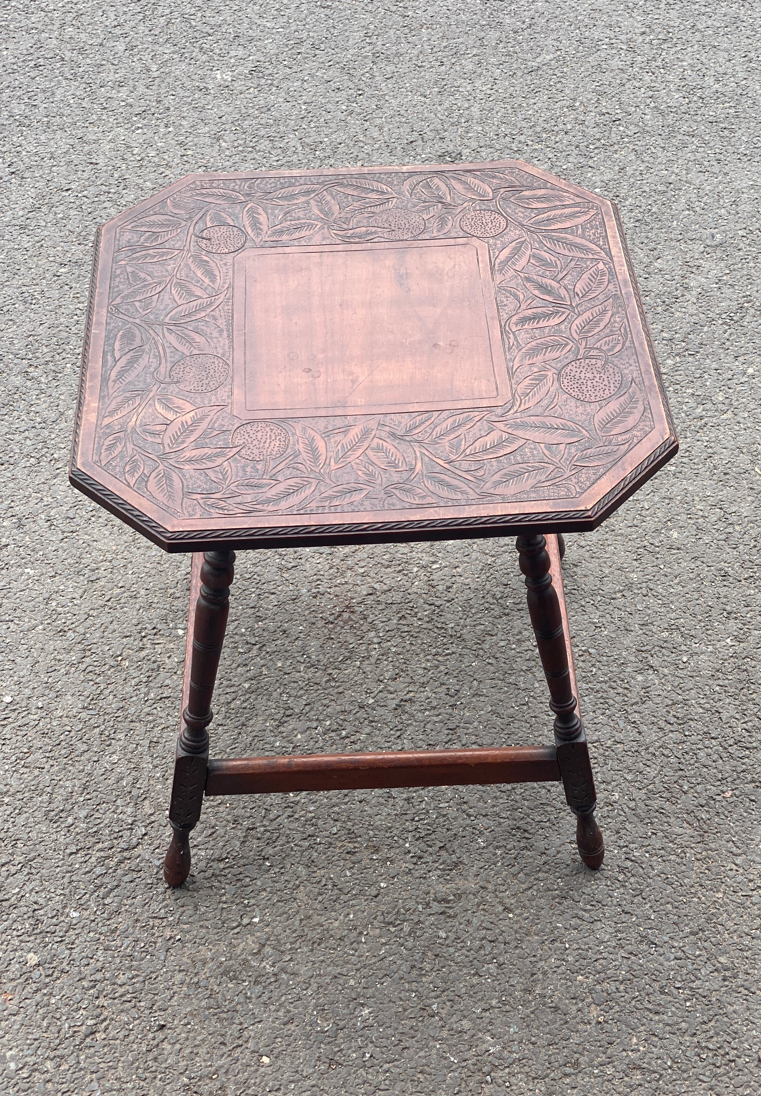 Craved top occasional table, Height 22.5 inches, Width 21 inches,