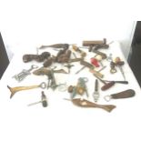 Large selection of cork screws and bottle openers