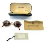 Emporio Armani vintage sunglasses, a pair of DKNY vintage sunglasses and a pair of Ralph Lauren