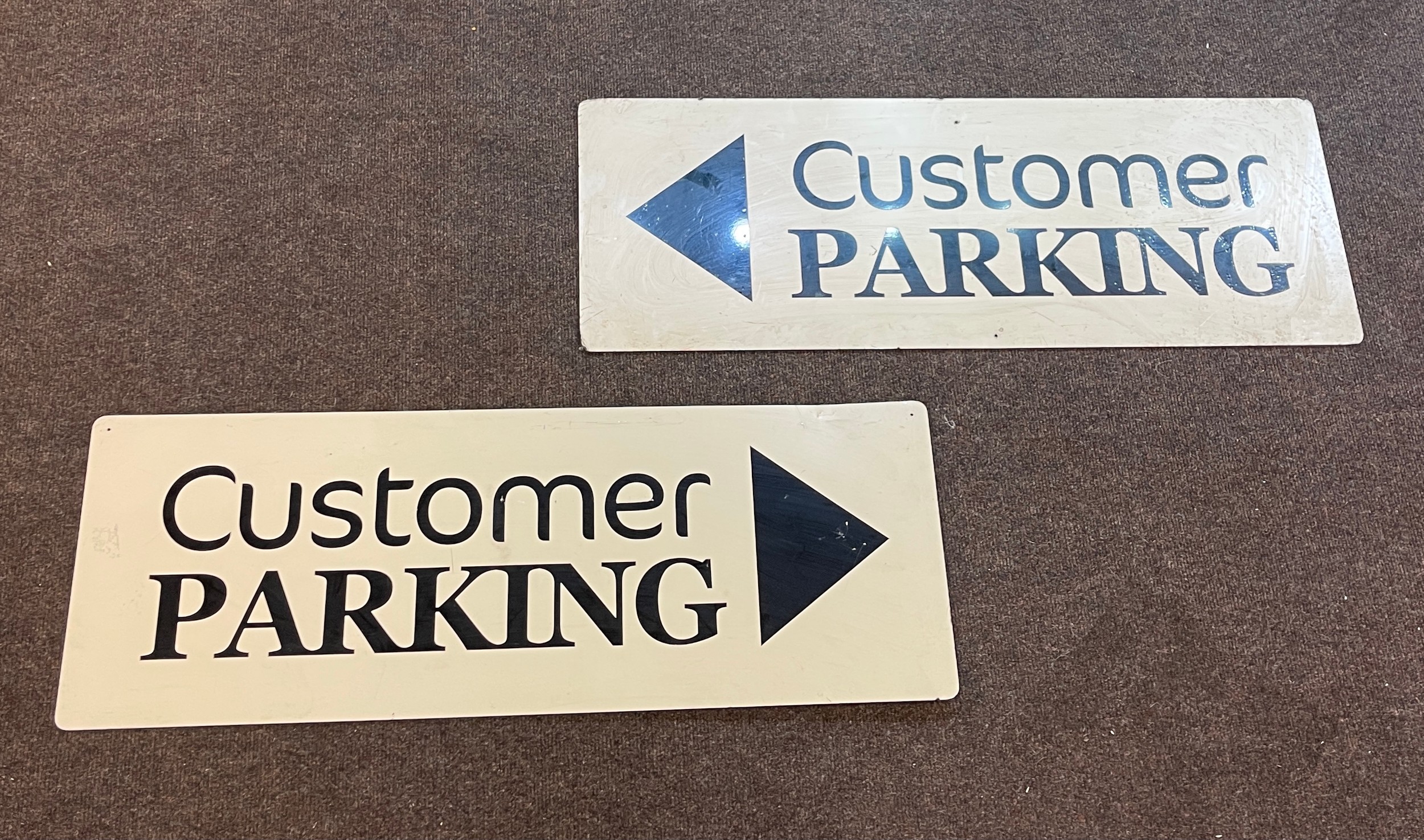 2 Perspex Customer parking signs, approximate measurements: Height 12 inches, Width 33 inches