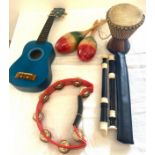 Selection of assorted musical instruments to include flutes tambourine etc