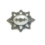 Vintage marcasite star brooch, stone set to the middle