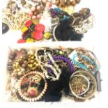 Large selection of assorted costme jewellery include beads, bracelets etc