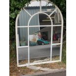 Arched framed mirror measures approx 45 inches tall and 33 inches wide