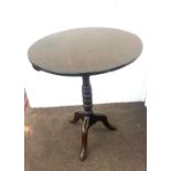 Oak tip top wine table measures approx 28 inches tall 23 inches diameter