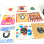 Selection of vintage single records to include Bon Jovi, Star hits and coral etc