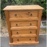 Four Drawer oak chest of draws measures approx 42 inches height, 18 inches depth and 34 inches wide