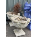 Two outdoor concrete planters measures approx height 18inches and diameter 19.5 inches