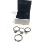 4 Silver pandora rings, largest ring size is S, smallest ring size is G/H