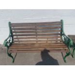 Cast iron ended teak wooden bench