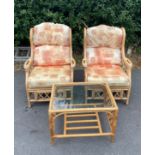 A three piece conservatory set includes two chairs and coffee table