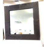 Leather framed squarer mirror measures approx 27inches square