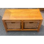 Beech and wicker two drawer coffee table measures approx 31 wide, 15 inches depth and 16 inches tall