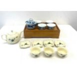 2 Oriental soup/ tea sets, one with wooden