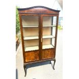 Two door glazed book case lockable with key measures approx height 65.5 inches by 34 inches wide and