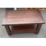 Dark oak two tier coffee table measures approx 19.5 height by 21 inches depth and 35 inches wide