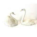 2 Lladro swan figures, largest measures approx 8.5 inches tall, over all good condition