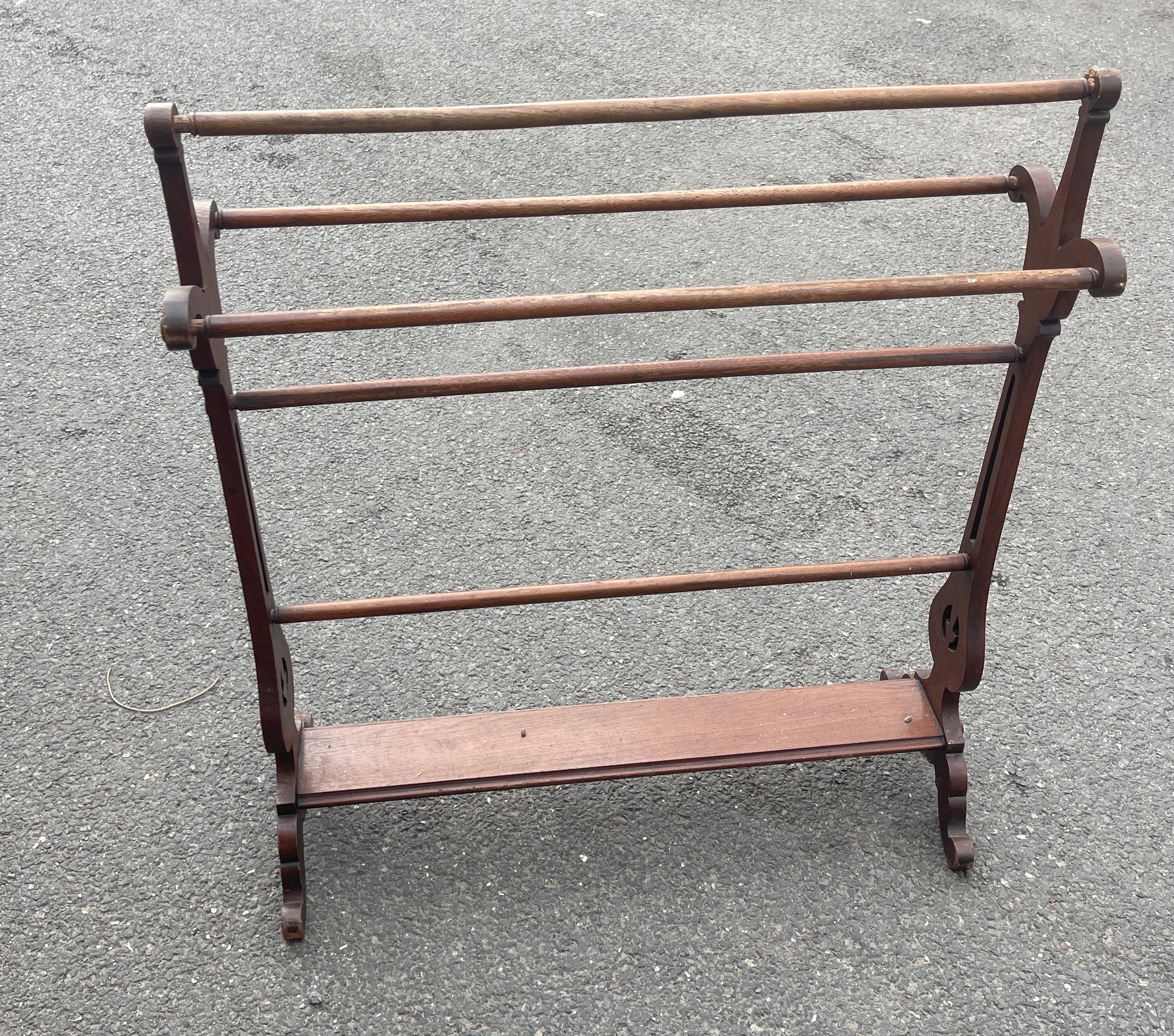 Mahogany towel rack measures approx height 36 inches high and 32 inches wide