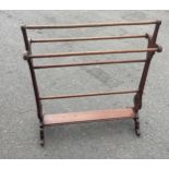 Mahogany towel rack measures approx height 36 inches high and 32 inches wide