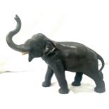 Bronze vintage elephant, missing tusk, makers mark on underneath of belly, approximate measurements: