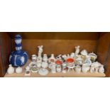 Quantity of crested ware including Goss, Wedgwood, Blue Jasperware, flask