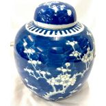 Antique Chinese Porcelain Prunus ginger jar and cover, approximate height 8.5 inches, damage to