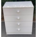 4 Drawer modern white chest of drawers, approximate measurements: Height 27 inches, Width 23.5