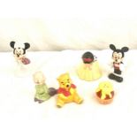 A selection of Disney china cruet pieces to include snow white, Winnie the Pooh and Mickey Mouse