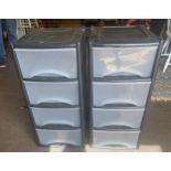 Two Plastic Storage approx measures height 31.5 inches by 15 inches wide