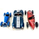 Vintage Bugatti metal model cars, to include a AC Cobra