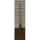 Mahogany pole stand measures 56.5 inches tall