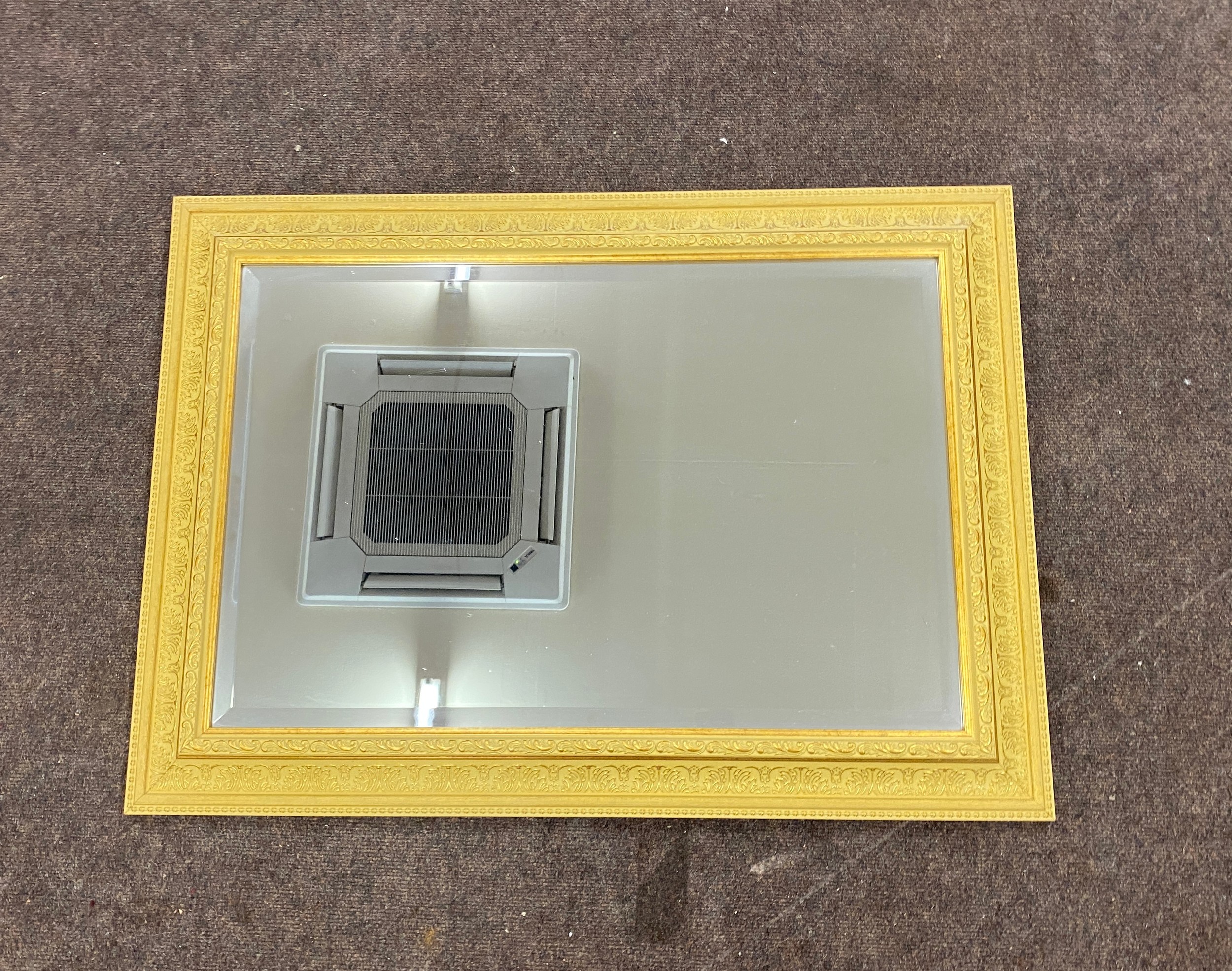 Bevelled edge gilt framed mirror measures 36 inches wide 26 inches tall