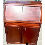 Mahogany drop front bureau, cupboard beneath, approximate measurements: Height 42.5 inches, Width