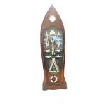 Cased ships knots display cabinet/ clock in the shape of a boat measures approx 32inches tall 8