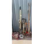 Selection of garden tools to include rakes, spades and forks etc